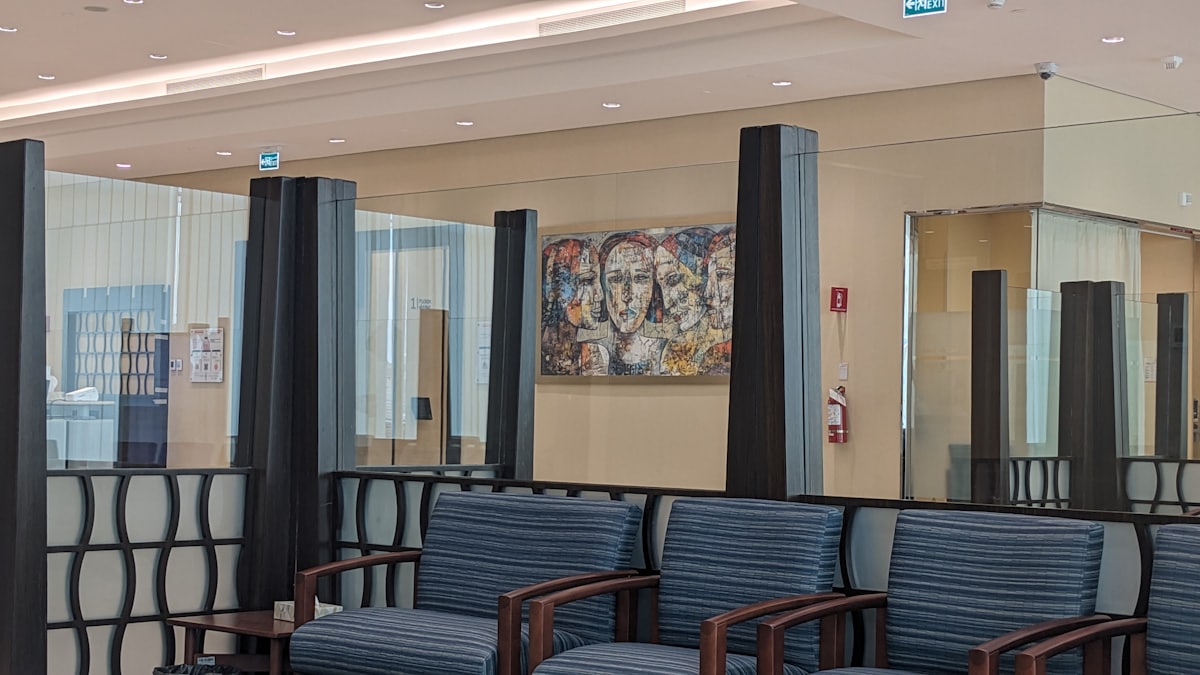 Clinic reception area with seating and natural light